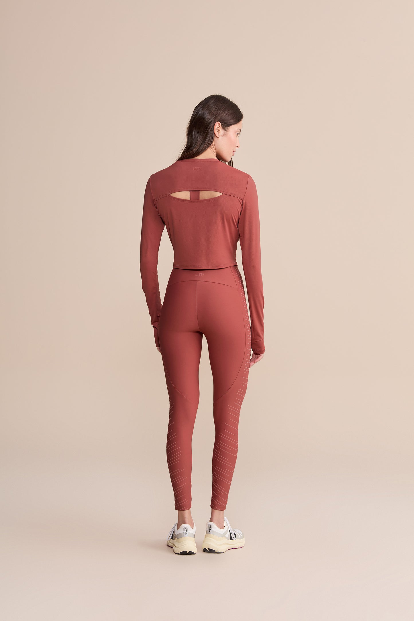 Action Skin® Cut Out Long Sleeve Top