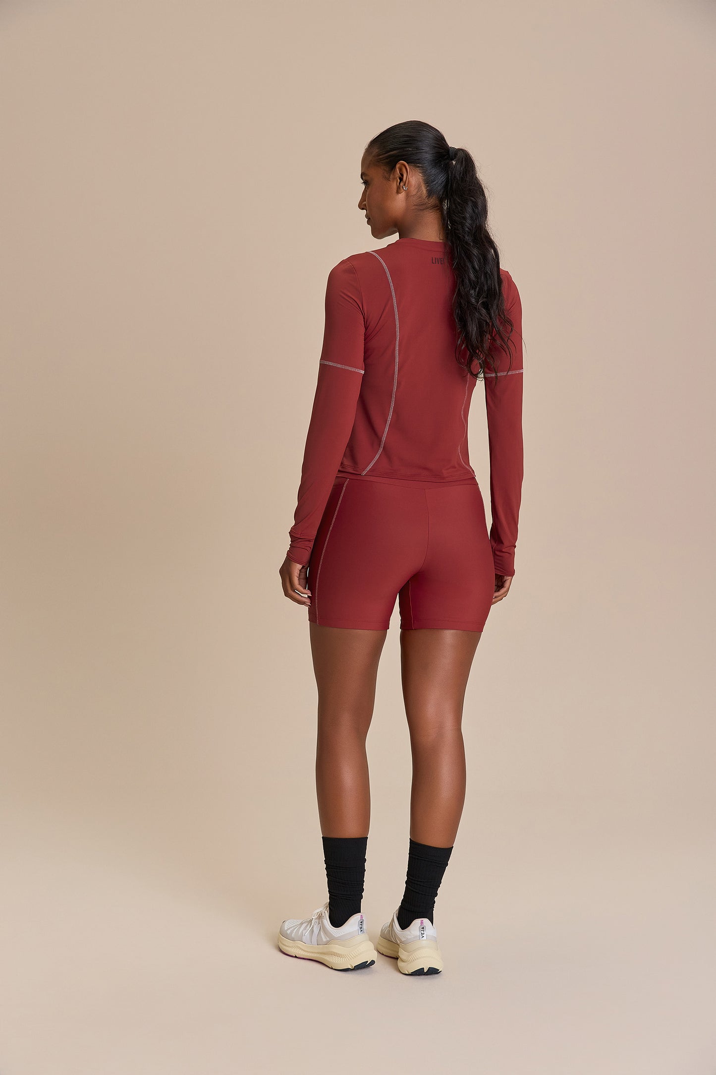 Long Sleeve Cut Out Clock Harmony Top
